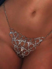 Silver bikini thongs featuring a heart pattern adorned with cubic zirconia rhinestones