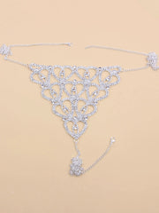 Silver bikini thongs featuring a heart pattern adorned with cubic zirconia rhinestones