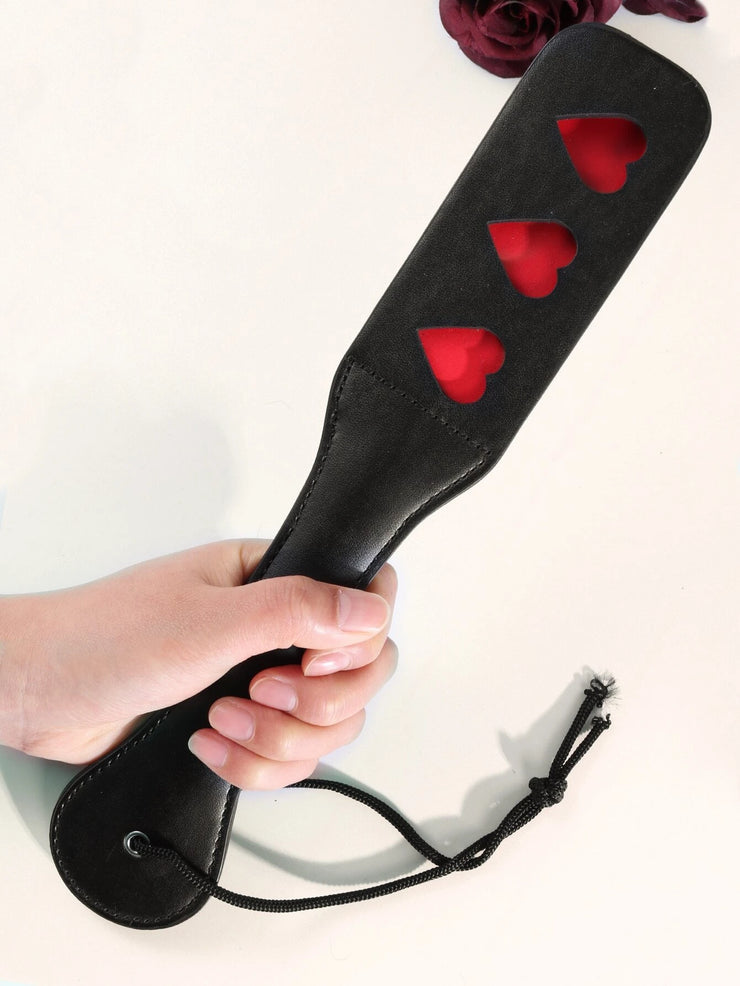 Double flapping thick leather spanker whip with heart-shaped cutouts